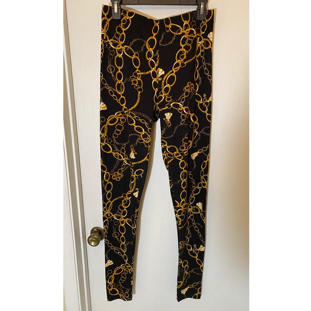 Fashion Nova gold & black leggings